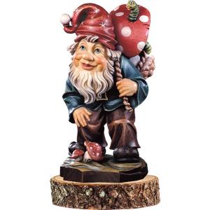Gnome mushroom-picker on pedestal
