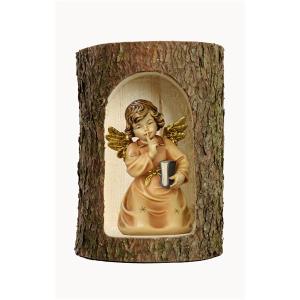 Bell angel with book in a tree trunk