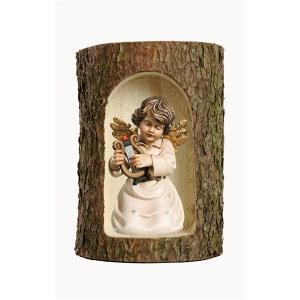 Bell angel with lyre in a tree trunk