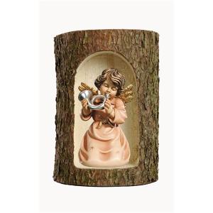 Bell angel with horn in a tree trunk