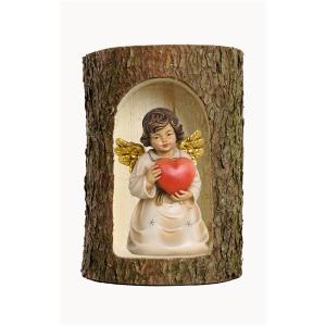 Bell angel with heart in a tree trunk