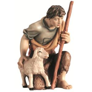 Shepherd kneeling