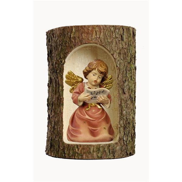 Bell angel with notes in a tree trunk - color