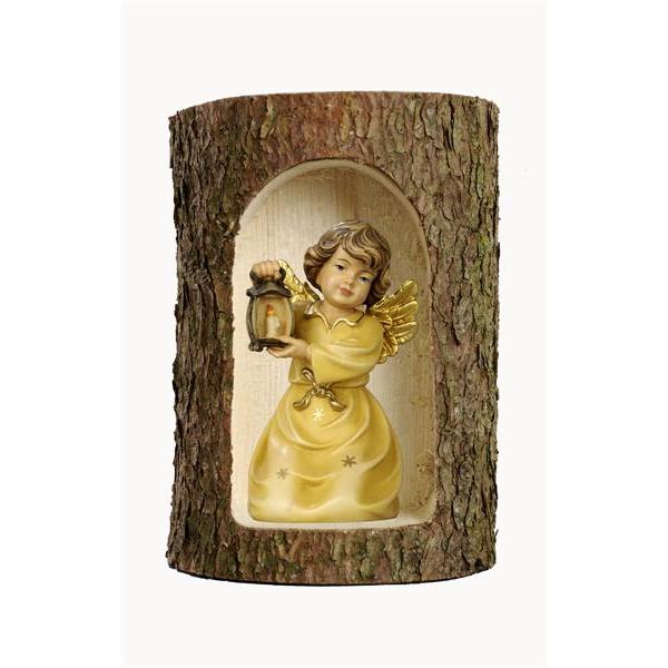 Bell angel with lantern in a tree trunk - color