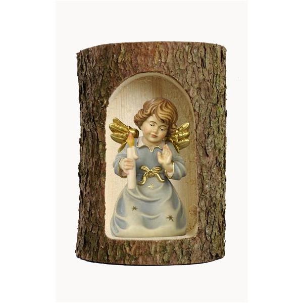 Bell angel with candle in a tree trunk - color